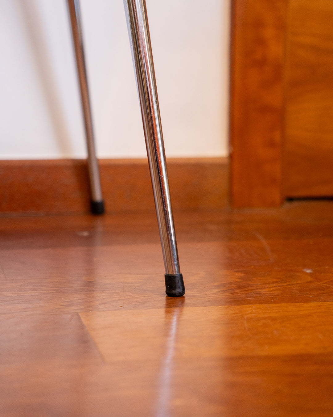 Vintage 1970s folding round table made of light wood-look formica with chrome legs and two drawers