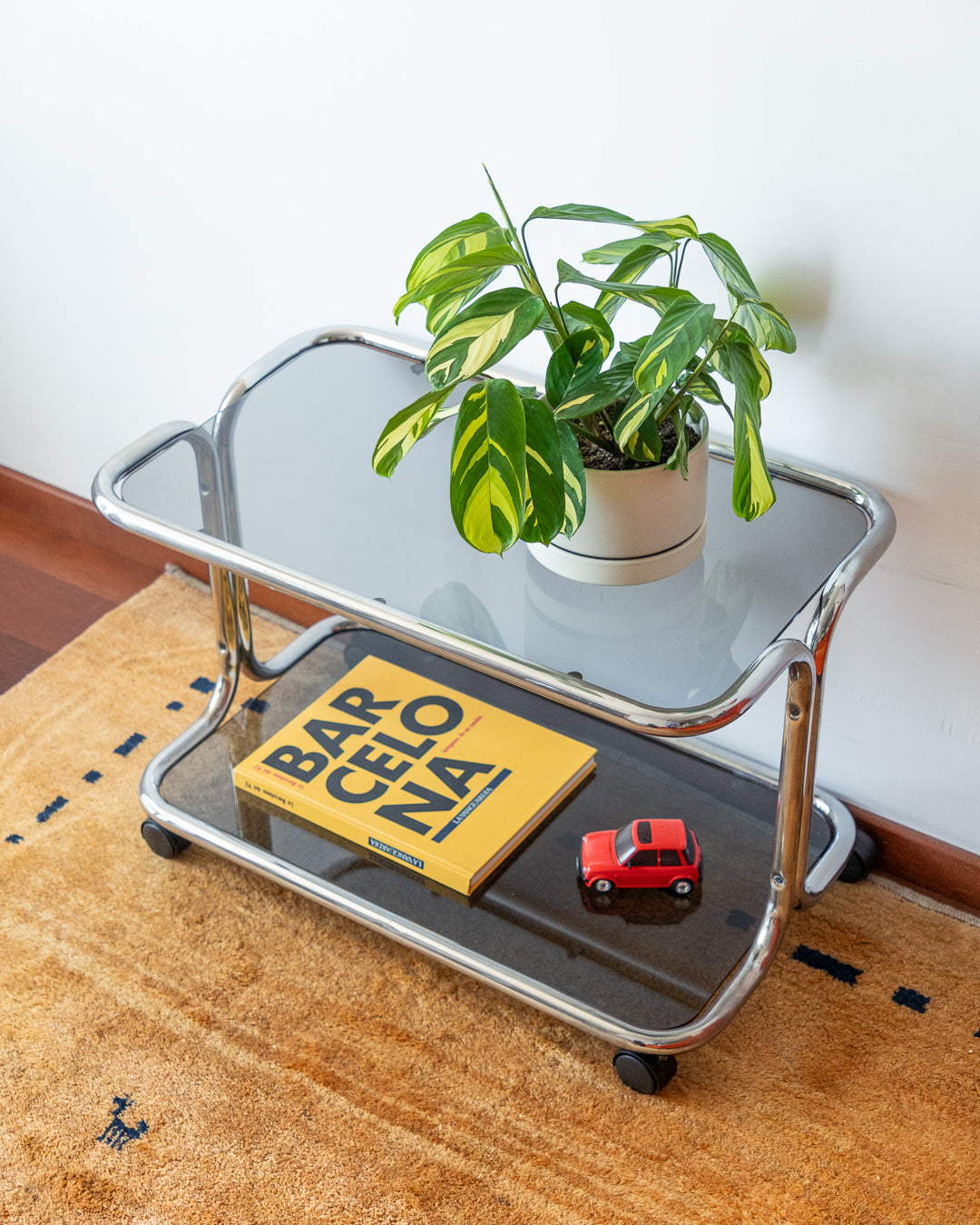 Vintage 1970s chrome side table with two smoked glass shelves – Vecino Shop