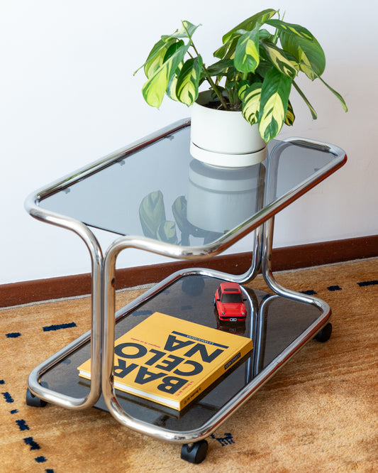 Vintage 1970s chrome side table with two smoked glass shelves – Vecino Shop