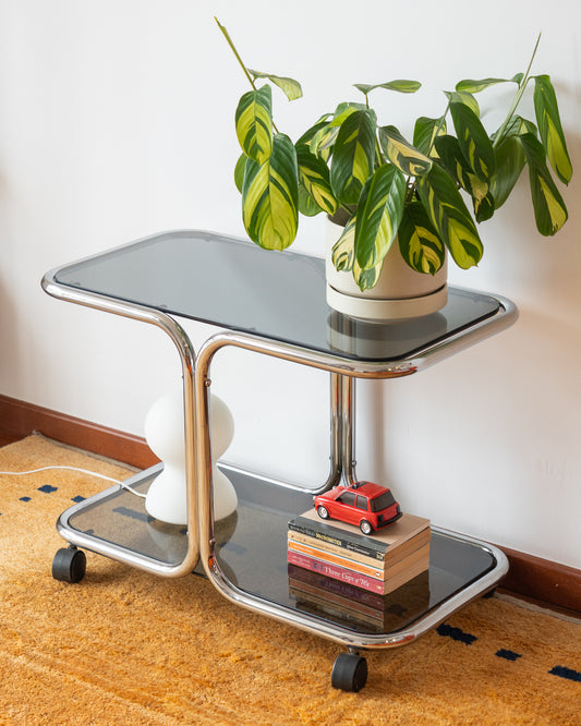 Vintage 1970s chrome side table with two smoked glass shelves – Vecino Shop