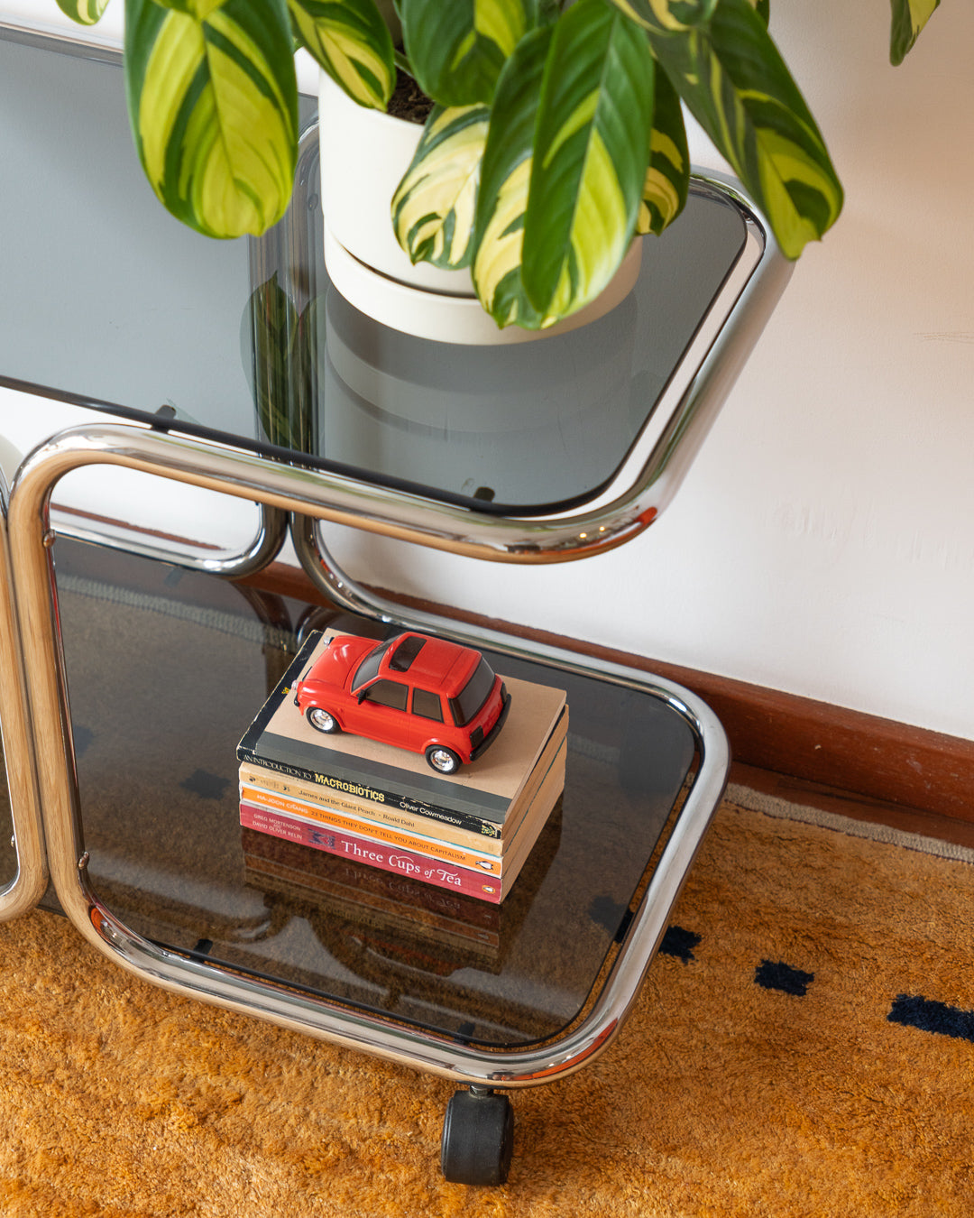 Vintage 1970s chrome side table with two smoked glass shelves – Vecino Shop