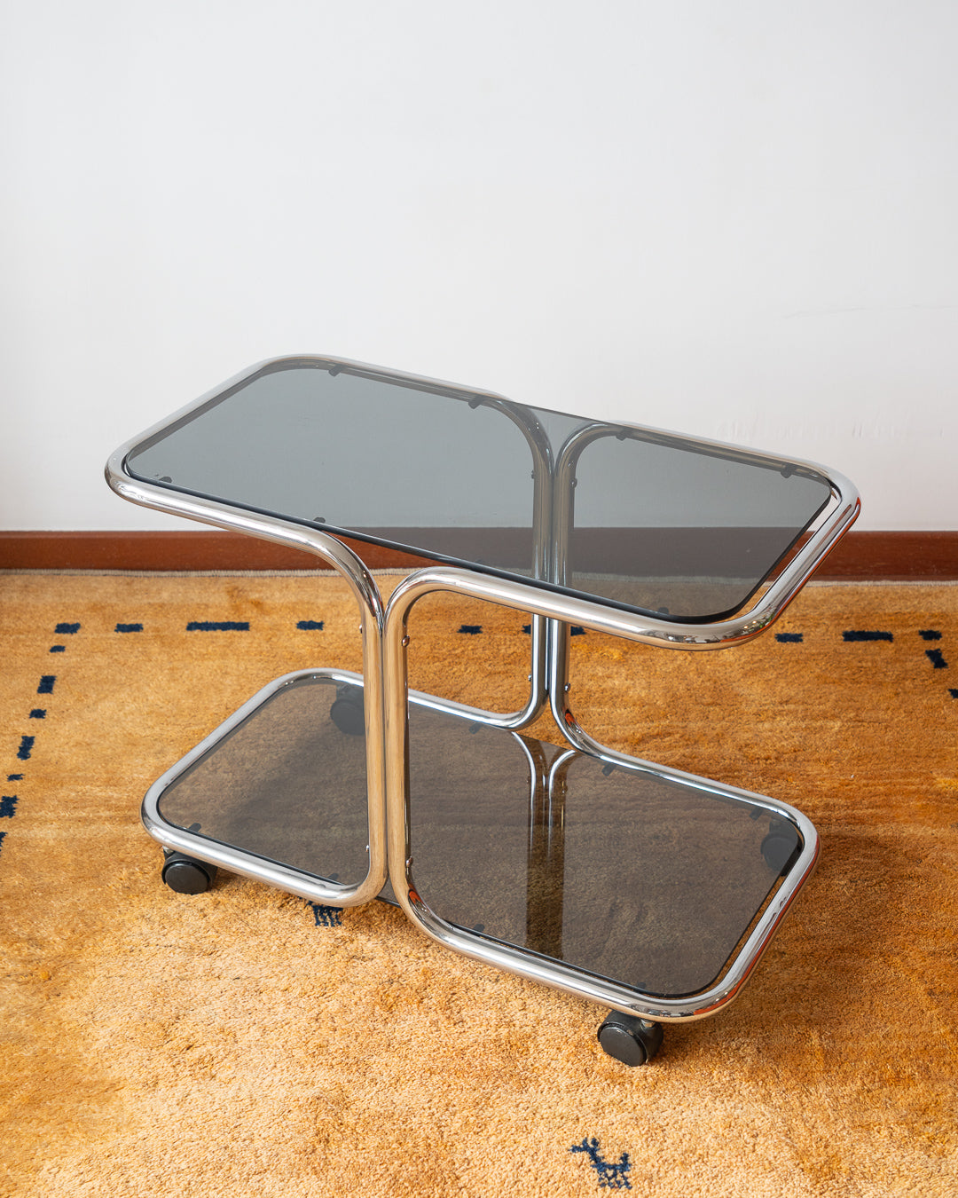 Vintage 1970s chrome side table with two smoked glass shelves – Vecino Shop
