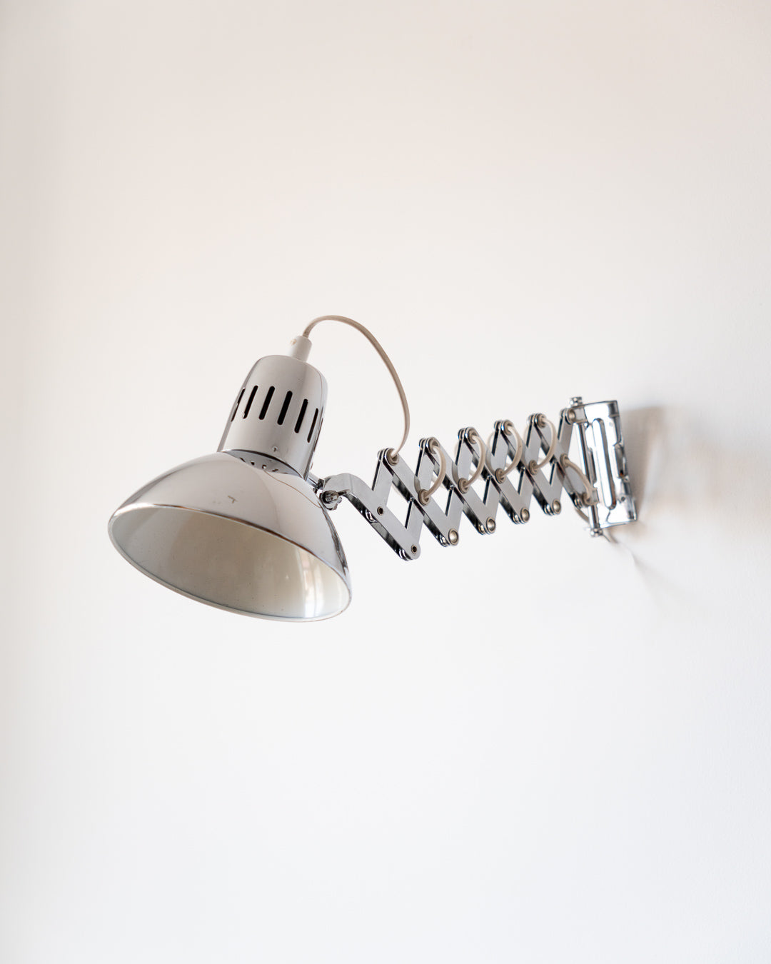 Vintage 1980s IKEA chrome scissor wall lamp – adjustable arm and chrome shade | Vecino Shop