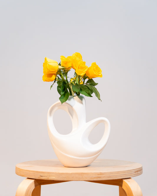 Vintage white glazed ceramic abstract vase from the 1980s with double handle detail. Vecino Shop