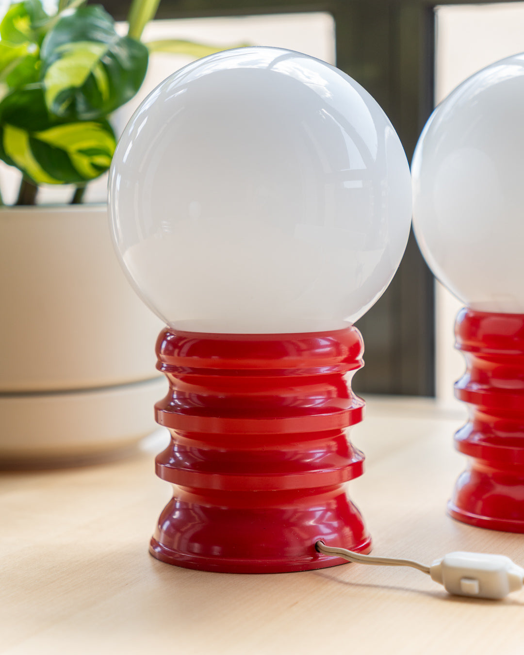 Vintage sculptural Space Age table lamps with red metal base and opaline glass globes – Vecino Shop