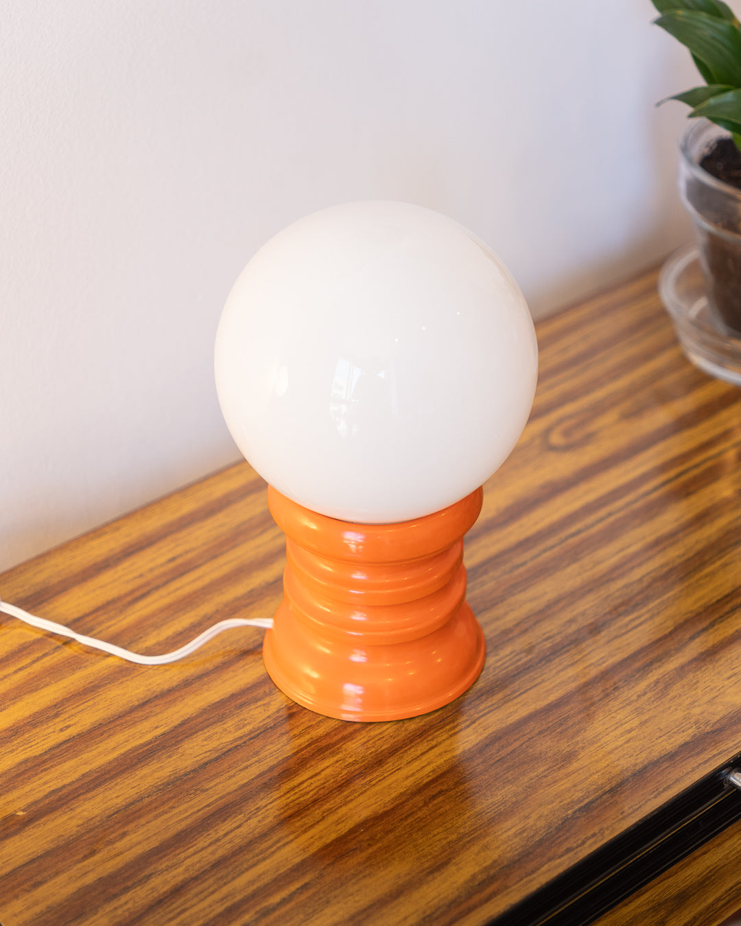Vintage space age table lamp with white opaline shade and orange tapered sculptural base – Vecino Shop